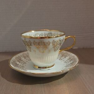 Elegant Gold and White Teacup Set